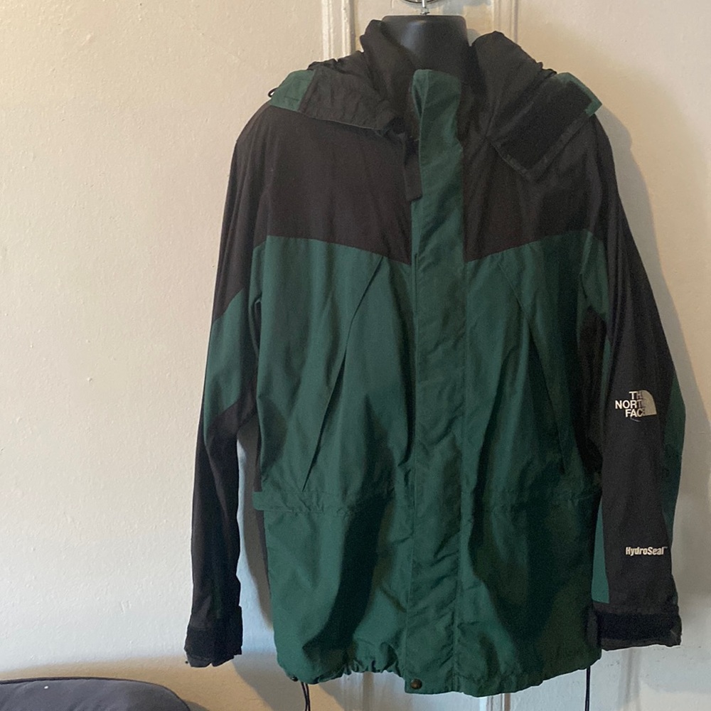 Green/black north face hoodie zippered waterproof/water resistant.Double lined